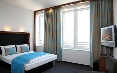 Bedroom at Motel One Edinburgh Royal Mile