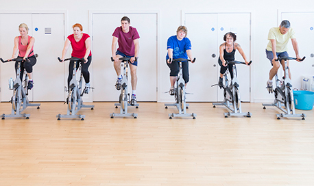 A busy spin class in session in the 西瓜视频 sports centre